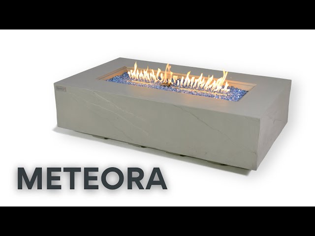 METEORA table with a lit fire pit