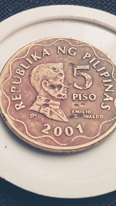 yr 2001 bsp 5piso w/ rare metal color &spread  chop blak holes afecting face name error obvers rever