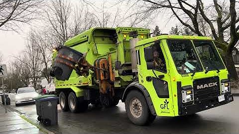 GFL Mack LR Labrie Automizer crushing wet recycle.