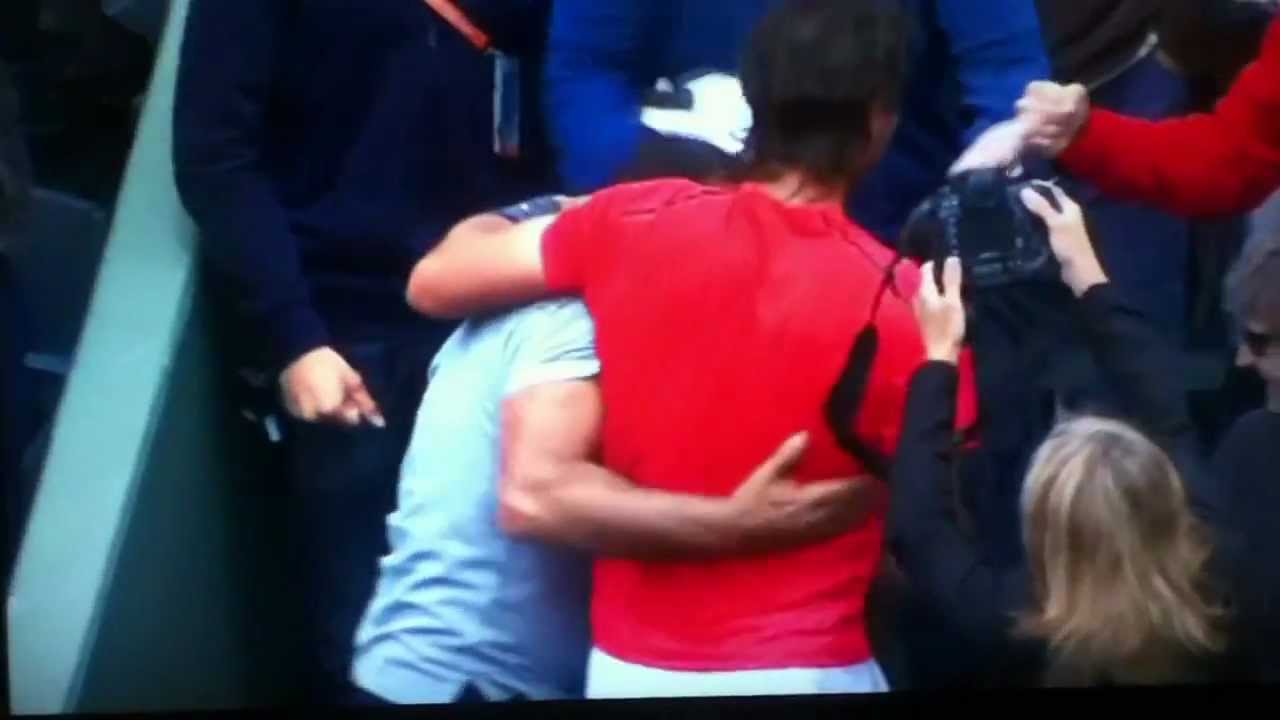 Rafa Nadal hugs his family and uncle Toni after the French open final 2012