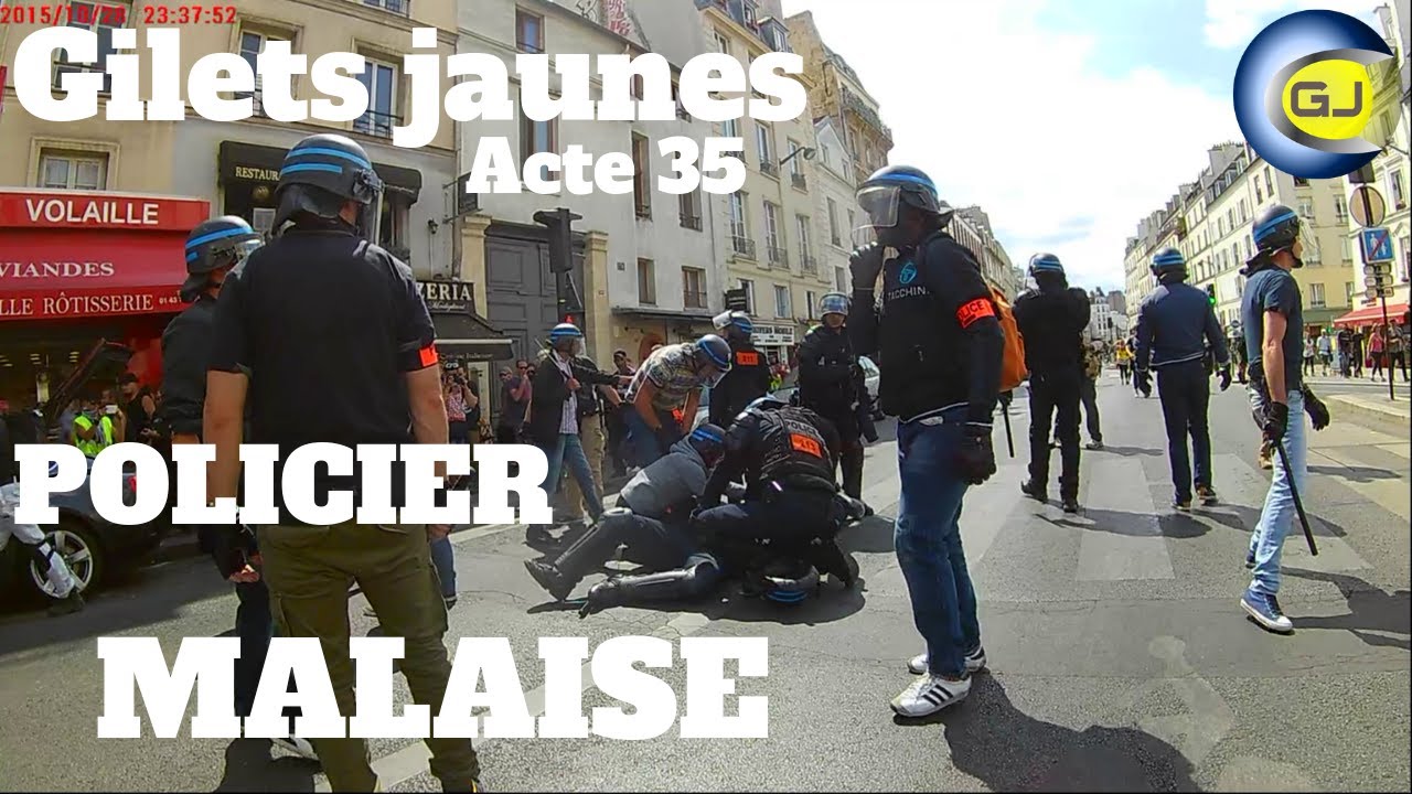 A Policeman Felt Faint And Collapses Vests Yellow Paris France Act 35 July 13 2019