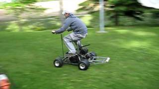 Custom barstool racer with wheelie bar 6.5 hp barstool racer with dual piston hydraulic brakes, aluminum axle, jackshaft and wheelie bar...enough to lift up the front end.