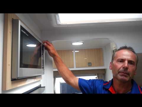 Montana Caravan: Sharp Carousel Microwave Oven.