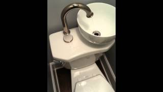 The toilet/sink combination...just flush the toilet and the fresh water supply flows through the faucet and down the sink into the toilets 