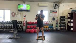 Heels Elevated Dumbbell Goblet Squat demonstration
