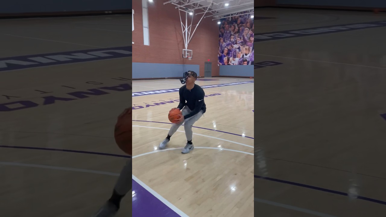 College basketball player using Hand In Yo Face Effectively basketball