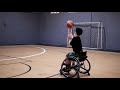 Try to shoot threes while sit in a wheelchair wheelchair basketball