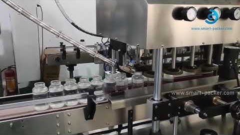 Automatic cap loading feeding bottle high speed capping machine testing video