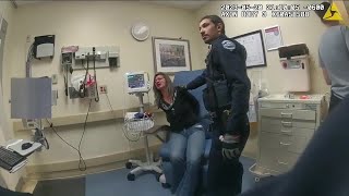 Loveland police body-worn camera shows officer punching woman after she spit at him