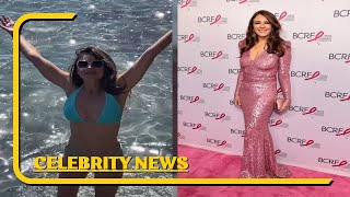 Liz Hurley parades her incredible bikini body as she dances in the ocean