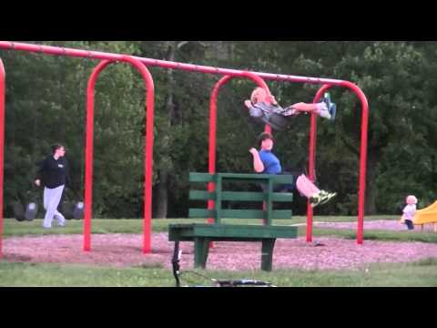 William and his buddy on swings