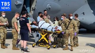 アフガンから脱出の女性、ドイツに着陸直後の米軍用機内で出産