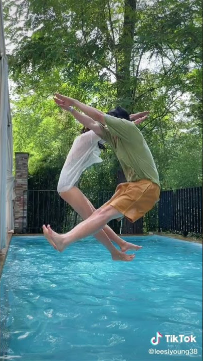 the  romantic couple doing jumping  matching swimming pool💕😍 prank video 😃#shorts