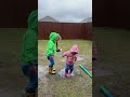 Drix & Emy splash in puddles