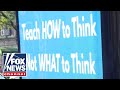 Parents place anti-'woke' ads outside NYC schools