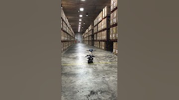 Infinium Scan Drone landing autonomously in a warehouse - automated inventory stock-taking by drones