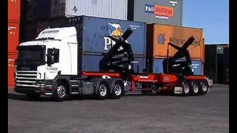 HAMMAR 151 S/HS -- Lifting and stacking 42 tonne containers with HAMMAR 151 Sidelifter