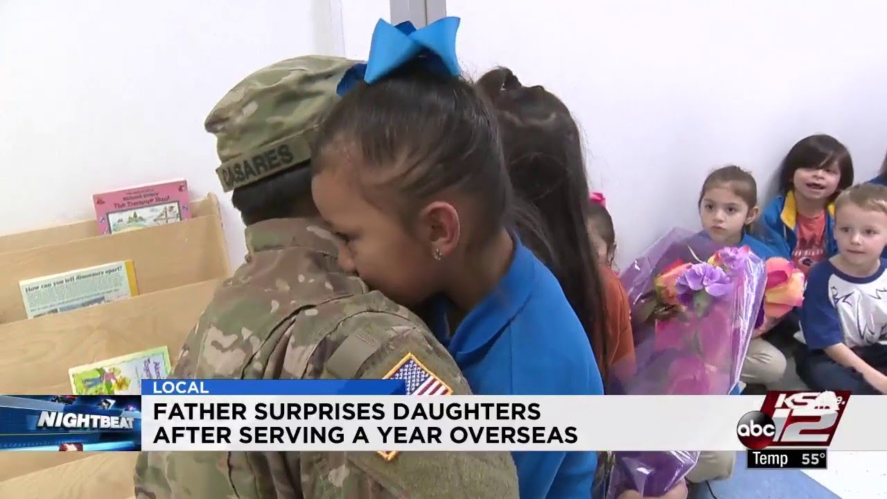 Military father surprises daughters after serving a year overseas
