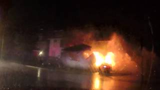 House explosion. Car vs. house with gas line severed. Regular speed then super slo mo.