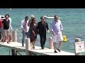 U2's singer Bono and Julian Lennon at club 55 in Saint Tropez