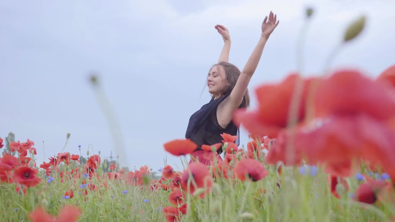 Girl Dancing Happily In a Field of Flowers Copyright Free Video