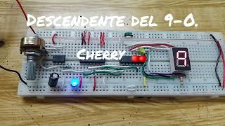 Práctica 15. Circuito de CONTADOR DESCENDENTE  9-0. Cena.