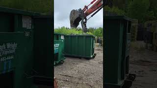 Heavy Equipment Makes For Short Work When Crushing Retired Lobster Traps