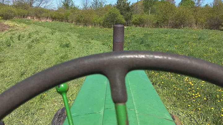 1949 John Deere model R plowing