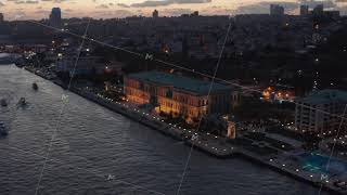 Beautiful Ciragan Palace Kempinski On Riverside Of Bosphorus In Istanbul At Dusk, Aerial View