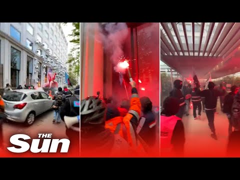 French pension protesters invade Louis Vuitton headquarters in Paris