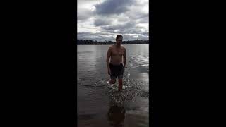 Plunge in a cold lake