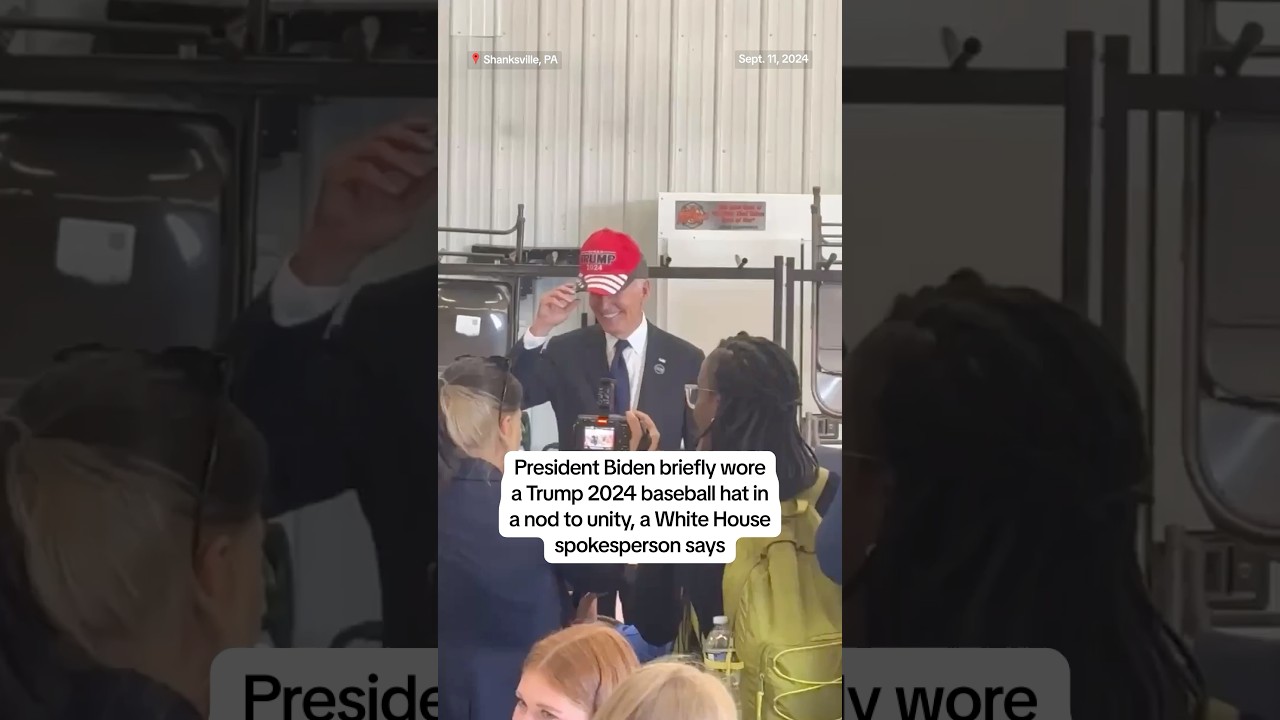 Biden wears Trump 2024 hat Biden wears Trump 2024 hat
