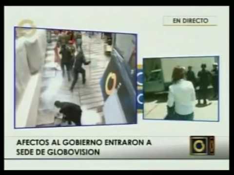 Chavez followers attacked with guns News Channel G...