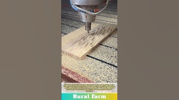 CNC woodworking router carve engrave: machine eroding wood into shape similar to a honeycomb pattern