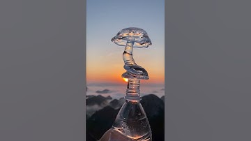 Try this way to shoot a creative short video while the sun rises over the sea of ​​clouds. There