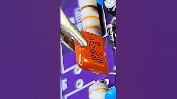 Mylar capacitors with code on body, one, zero, four #howto #value #mylar #capacitor #electronic
