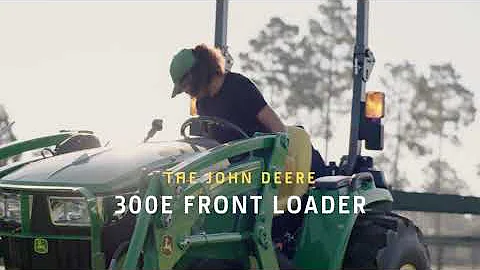 Kolik váží nakladač John Deere 300?