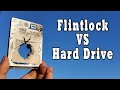 Shooting a computer hard drive with a Flintlock Rifle