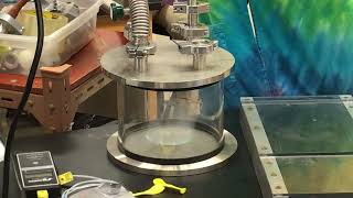 How to Make Solid Air in a Vacuum Chamber