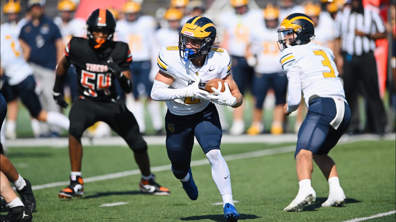 Clarkston Wolves rout rival Belleville Tigers 38-7 in 2025 Amazon Prep ...