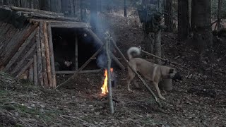 OVERNIGHT: EARTH LODGE CABIN, FURTHER CONSTRUCTION, FIRE INSIDE MADE A CHIMNEY OUT OF CLAY AND STONE