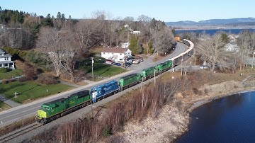 Awesome Aerial 4K View! Nice Big Lashup on Stack Train NBSR 120 Passing Grand Bay - Westfield, NB