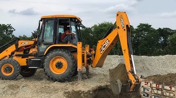 JCB Backhoe Loading on Mixed Ballast Tipper in Crusher Industry