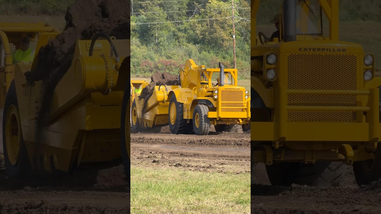 Cat 660 with 650 bowl getting push loaded by a double D9 dozer at The Century of Caterpillar event