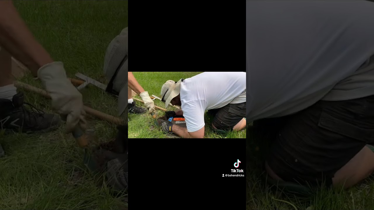 Repairing grave of Laura M. Boylan