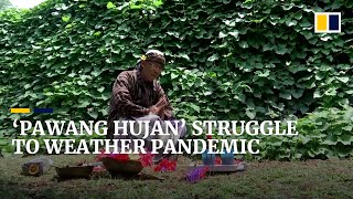 Indonesia’s mystical rain shamans return after long dry spell from Covid-19