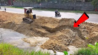 Update Project Shows the pouring of soil around the pond Up by Dozer Komatsu D31P