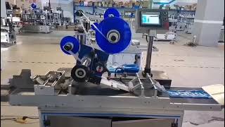 Self adhesive sticker automatic paging top labeling applicator for bag or pouch #pouch labeling
