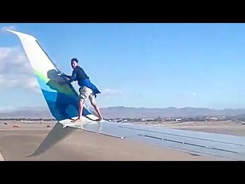 Man Climbs Plane Wing and Falls