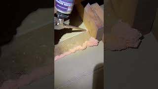 Air sealing an attic with expanding foam